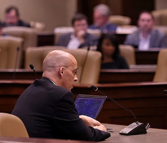 Tom Harford, Arkansas Blockchain Council founder and board member, answers a question about cryptocurrency during a meeting of the Joint Committee on Advanced Communications and Information Technology and Committee on En.jpg